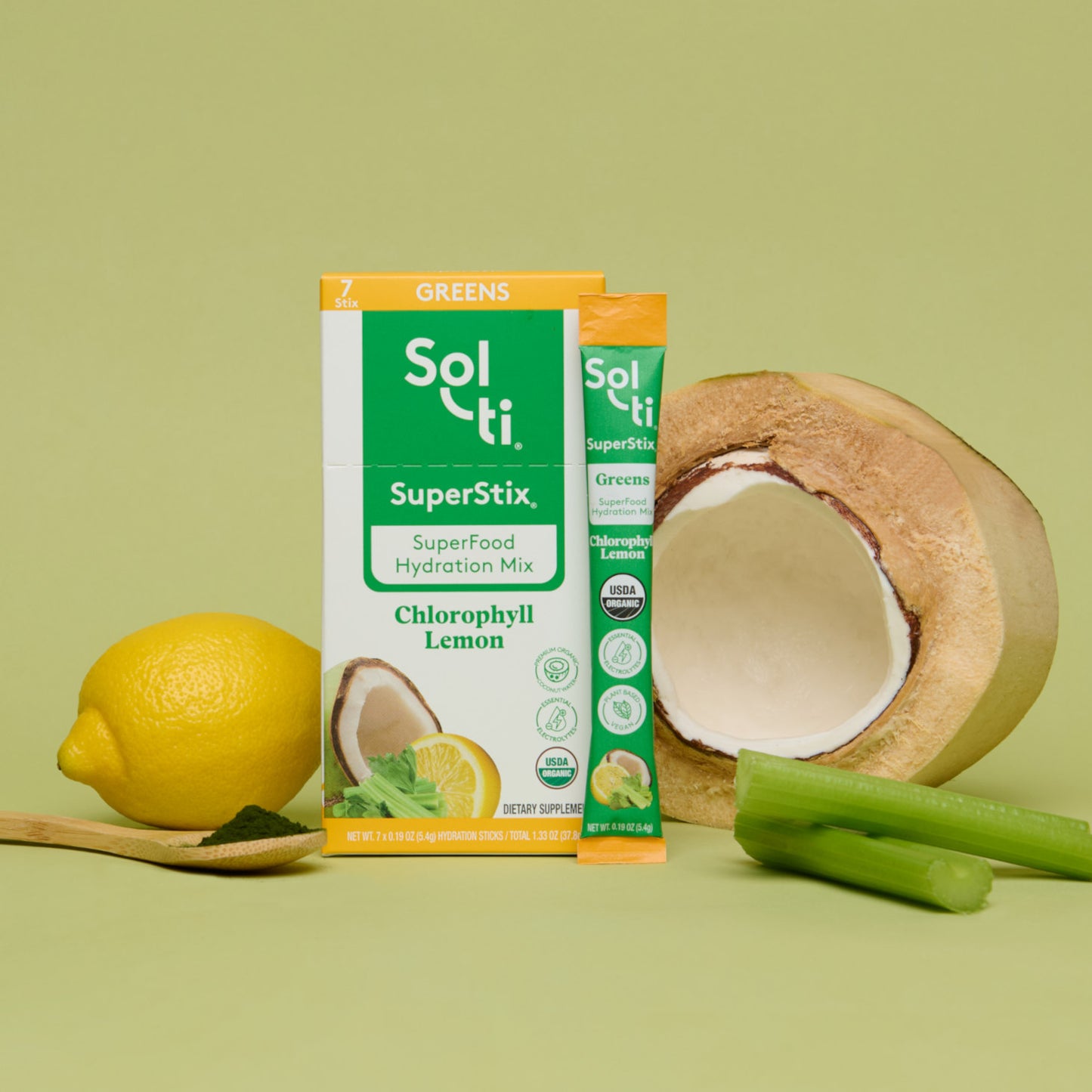 Sol-ti SuperStix Chlorophyll Lemon box and stick pack with lemon, coconut, and celery, front view, light green background