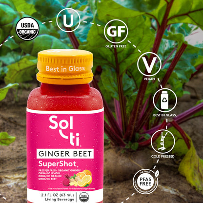 GINGER BEET SuperShot bottle with front label on beet plants background, with logo benefits: USDA Organic, kosher, Gluten Free, Vegan, Best in Glass, Cold pressed and Lab tested No forever Chemicals or microplastics 